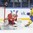 MAGNITOGORSK, RUSSIA - APRIL 21: Belarus's Nikita Tolopilo #25 makes pad save on Sweden's Jonatan Berggren #17 during preliminary round action at the 2018 IIHF Ice Hockey U18 World Championship. (Photo by Steve Kingsman/HHOF-IIHF Images)

